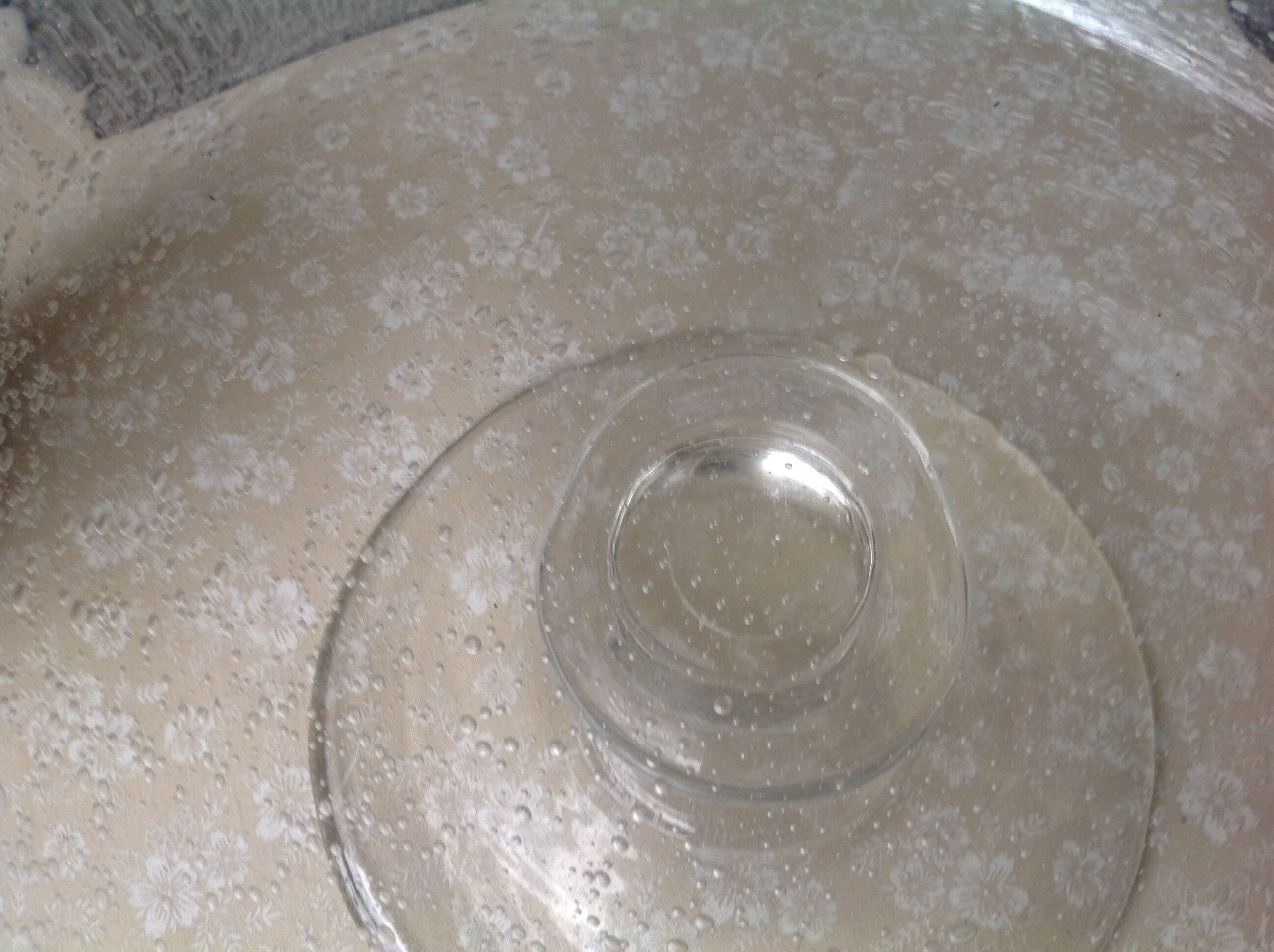 Biot cup in blown bubbled glass on foot