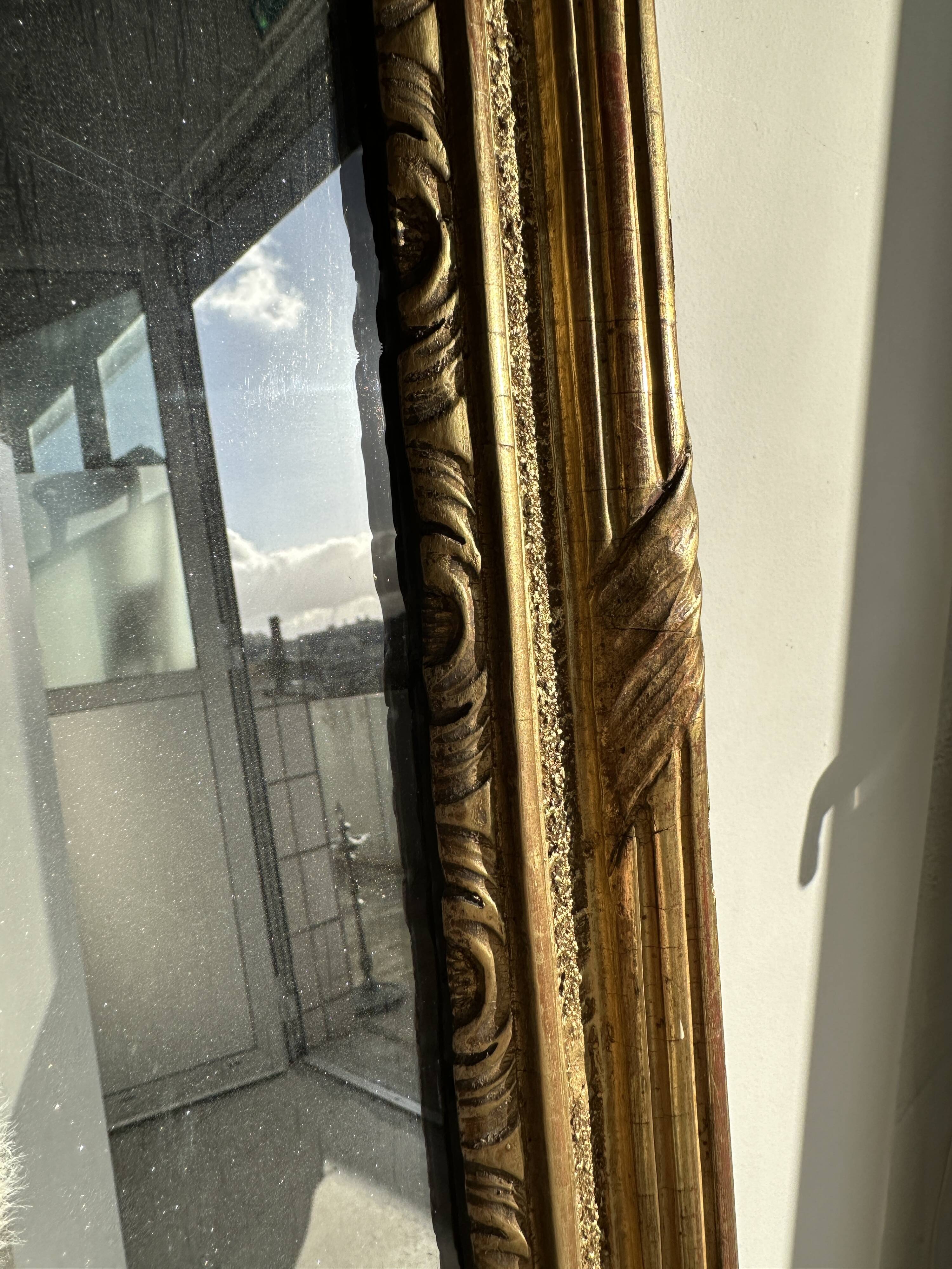 Large gilded mirror 19th century rounded corners mercury glass Louis XVI style
