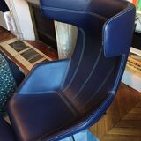 Arrow swivel armchair and foot rests by Alfredo Haberli for Moroso