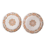 Two 18th century earthenware plates with grand feu decoration in ochre, green and manganese