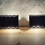 Pair of wall sconces with adjustable shutter