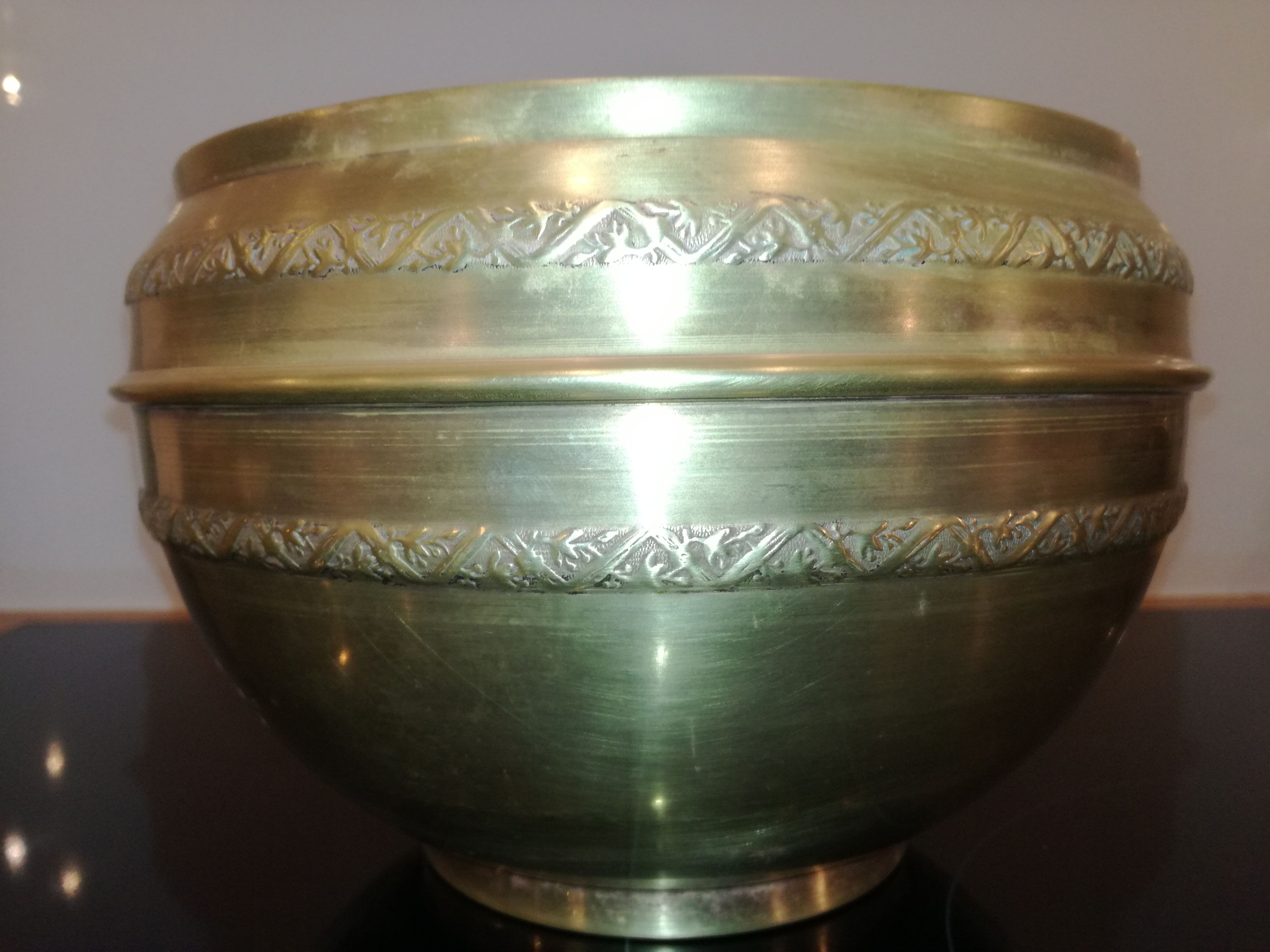 Brass pot cover