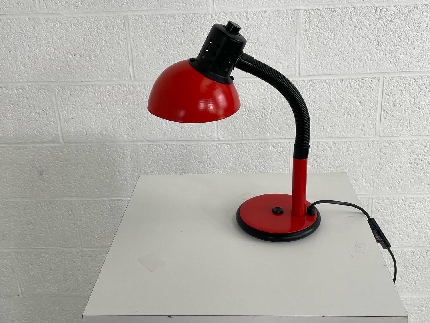 Red aluminor desk lamp from the 70s