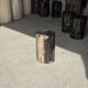 Small side table in black petrified wood with stripes and beige sides H28 D18.