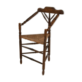 Fauteuil antique en osier