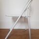 Vintage perforated metal folding chair
