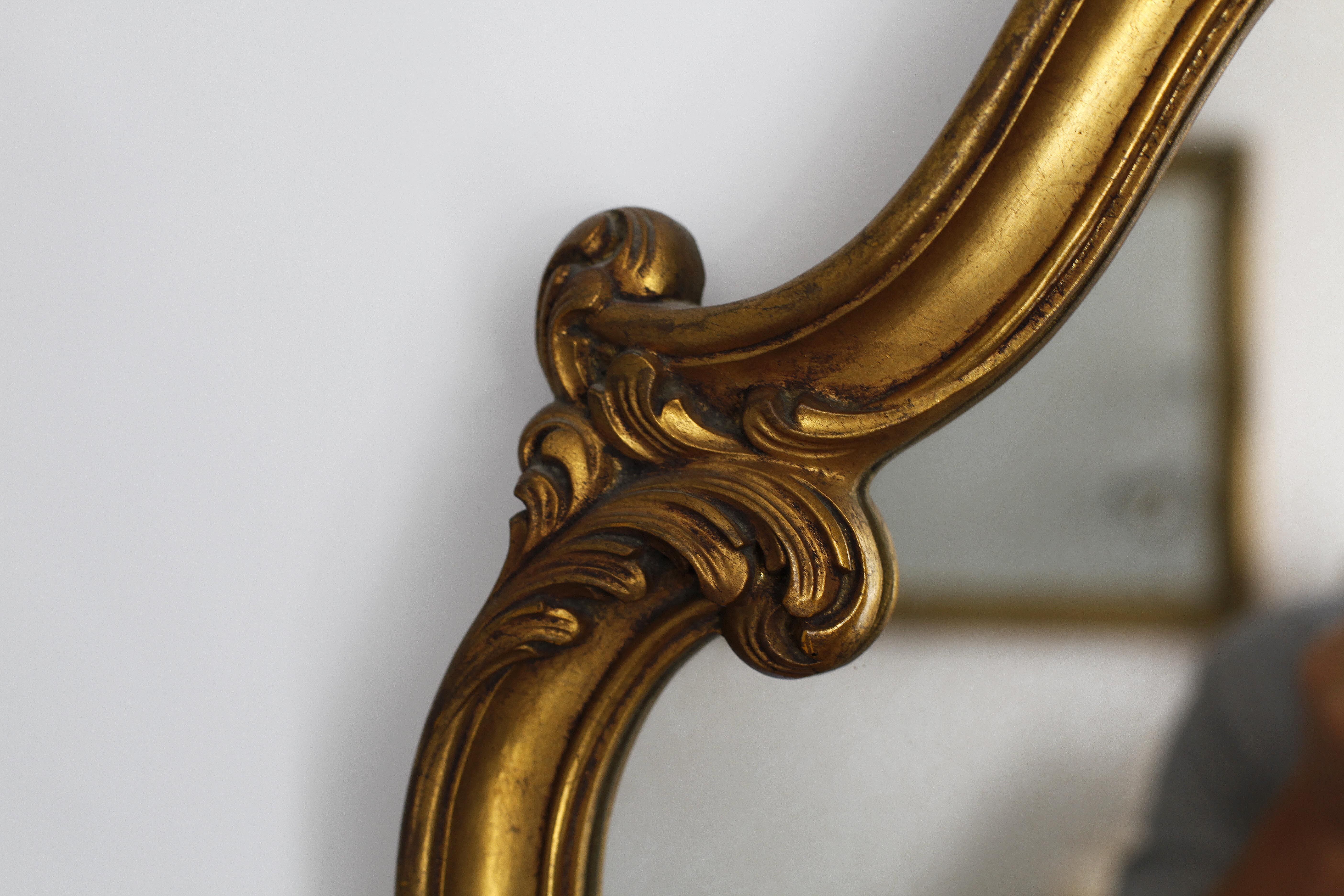 Antique golden shell mirror