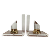 Vintage pair of bookends in lucite and brass from the 1970s.