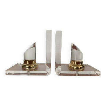 Vintage pair of bookends in lucite and brass from the 1970s.