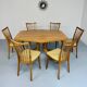 Ancienne table en bois massif octogonal a rallonge design Girsberger