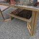 Table basse à deux niveaux verre et laiton