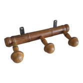 Wall-mounted coat rack in solid wood - mid 20th century
