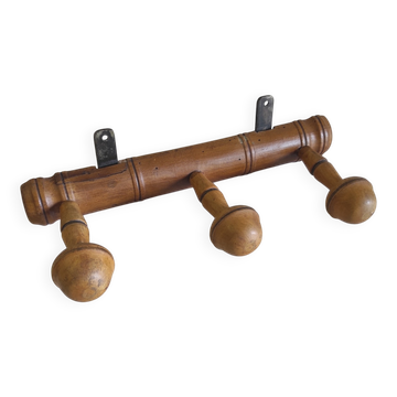 Wall-mounted coat rack in solid wood - mid 20th century