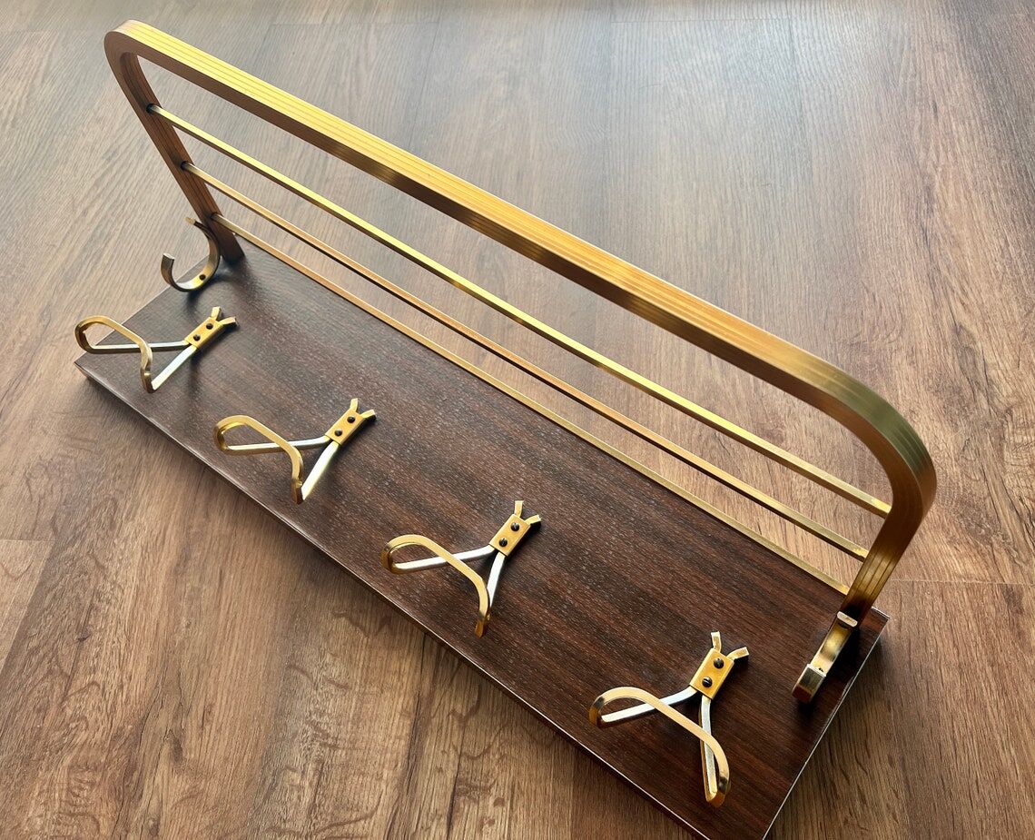 Vintage coat rack with 1970s repai décor