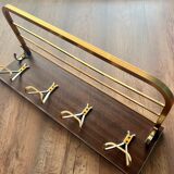 Vintage coat rack with 1970s repai décor