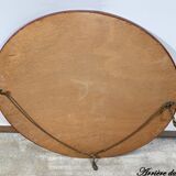Miroir ovale en bois doré – début XXe