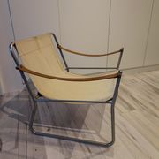 Scandinavian living room armchair in tubular chrome and leather