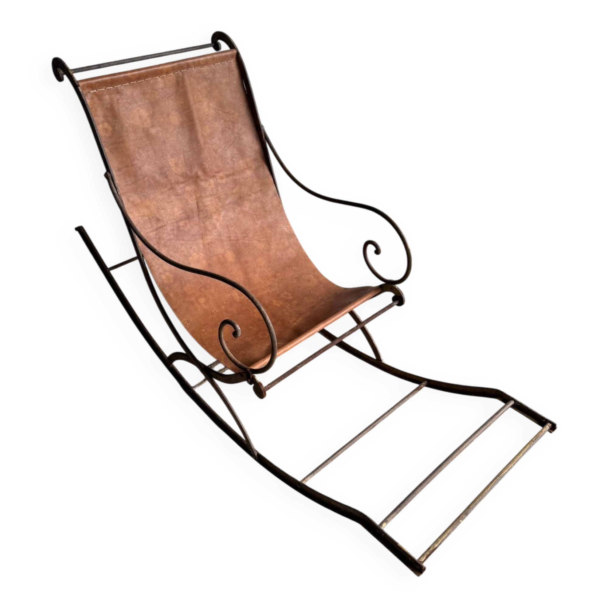 19th-century dark brown wrought-metal rocking chair with cognac leather sling seat, vintage