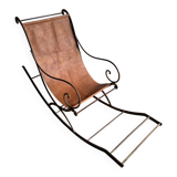 19th-century dark brown wrought-metal rocking chair with cognac leather sling seat, vintage