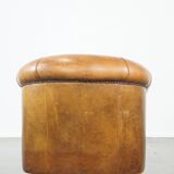 Fauteuil club en cuir de mouton patiné couleur cognac