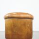 Cognac-colored sheep leather club chair with patina