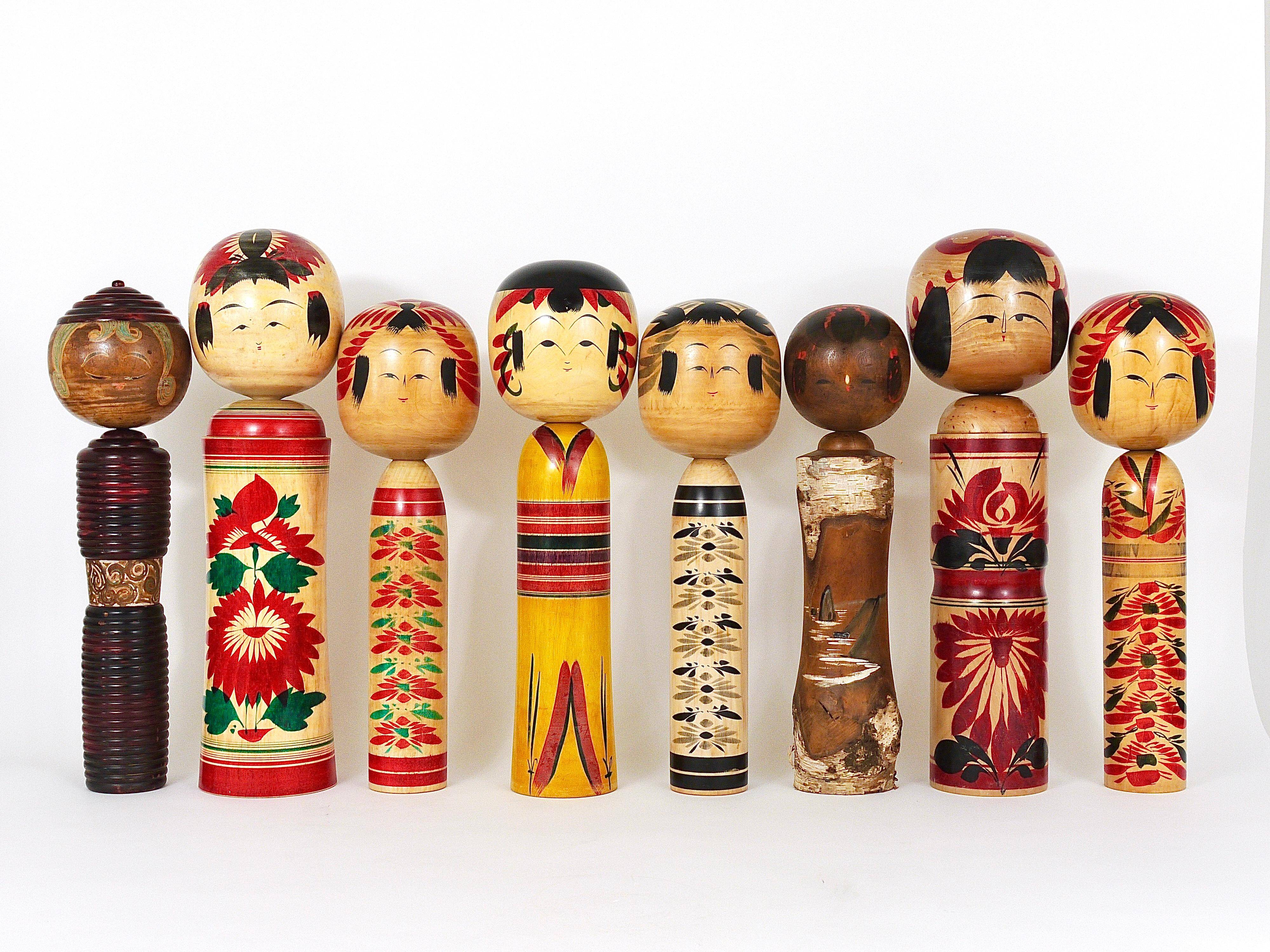 Decorative Kokeshi doll sculpture from northern Japan, hand-painted, signed.