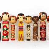 Decorative Kokeshi doll sculpture from northern Japan, hand-painted, signed.