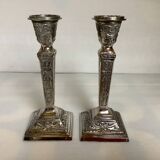 Pair of ornate silver candlesticks