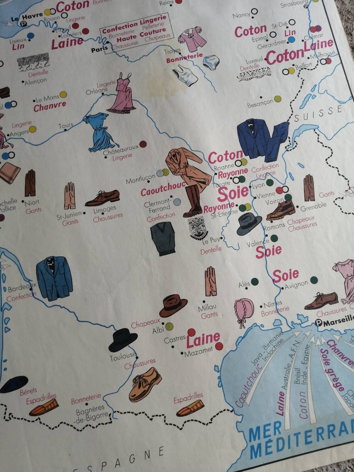 Vintage school map of France "Commerce and Clothing"