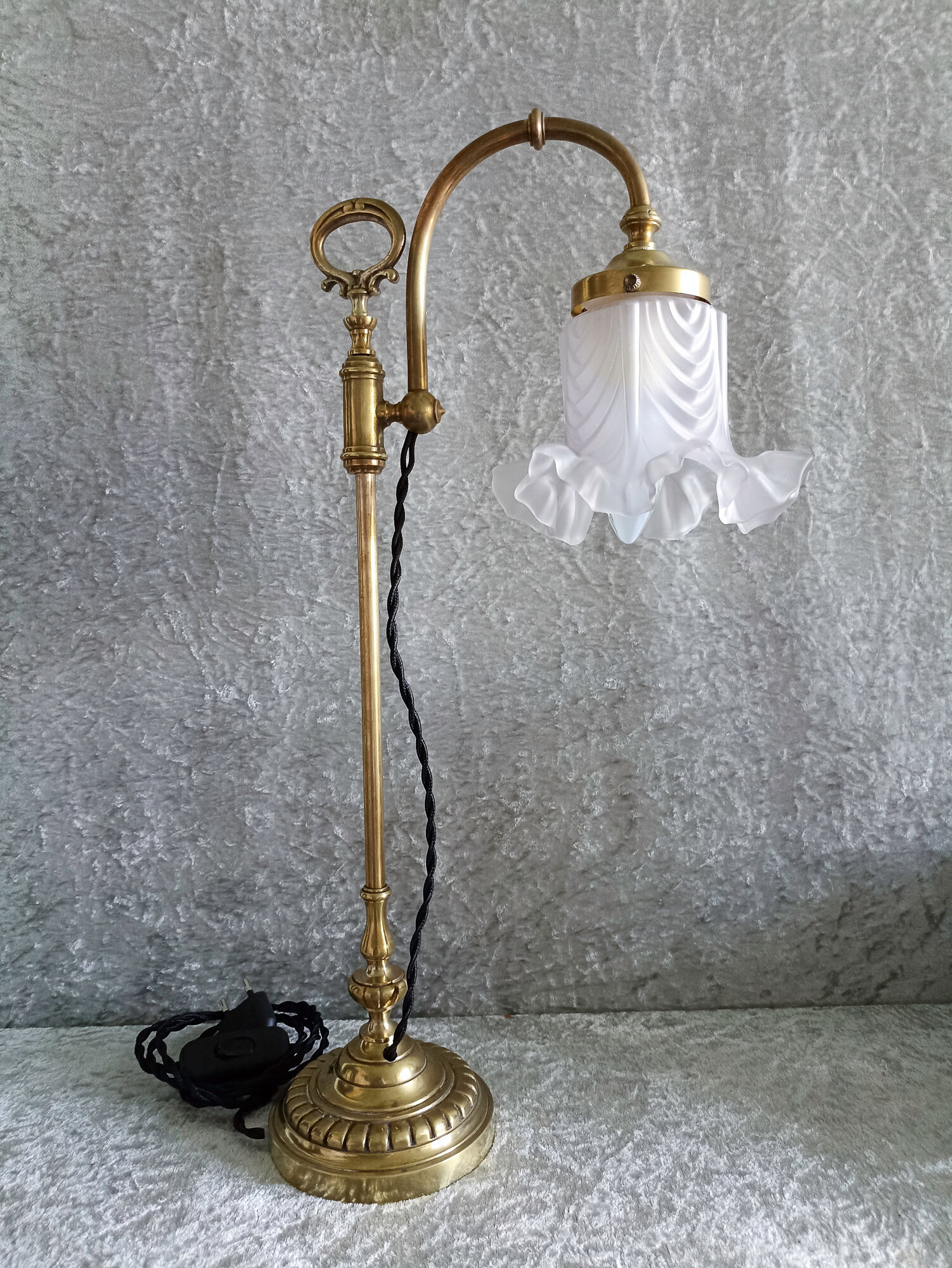 Adjustable brass desk lamp with frosted glass tulip