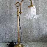 Adjustable brass desk lamp with frosted glass tulip