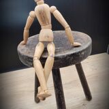 Massive black tripod stool