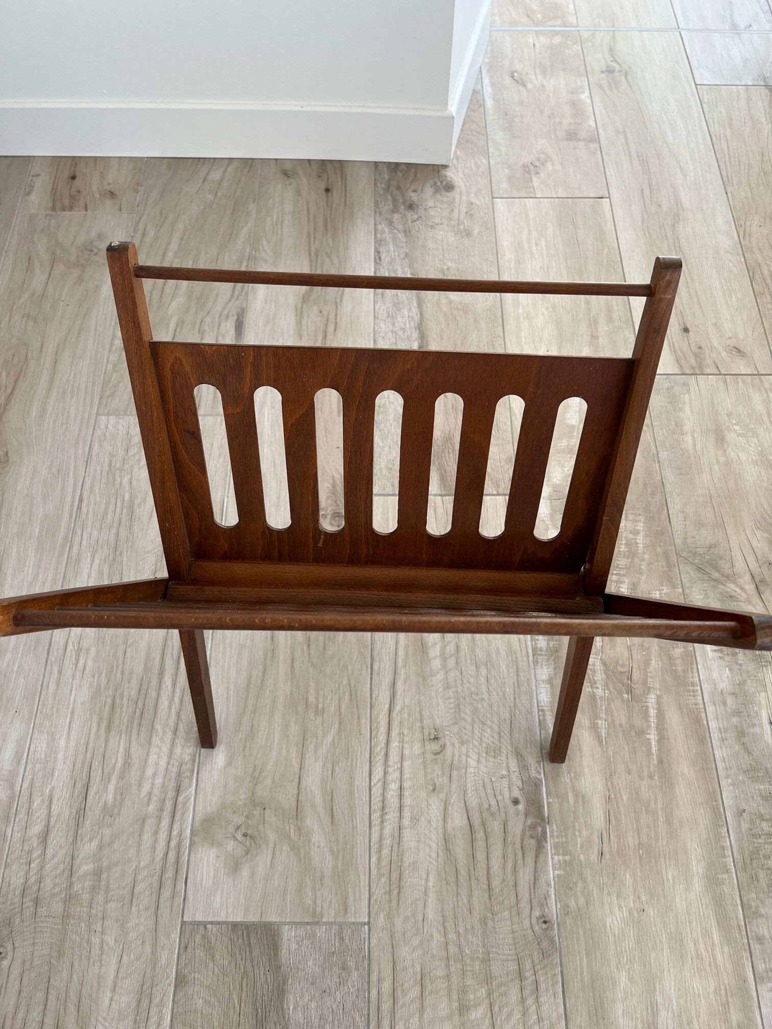 Folding magazine door