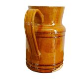 Pichet ancien en faïence française à glaçure orange