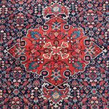 Tapis persan noué main des années 50