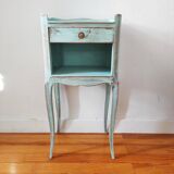 Patinated bedside table end of sofa