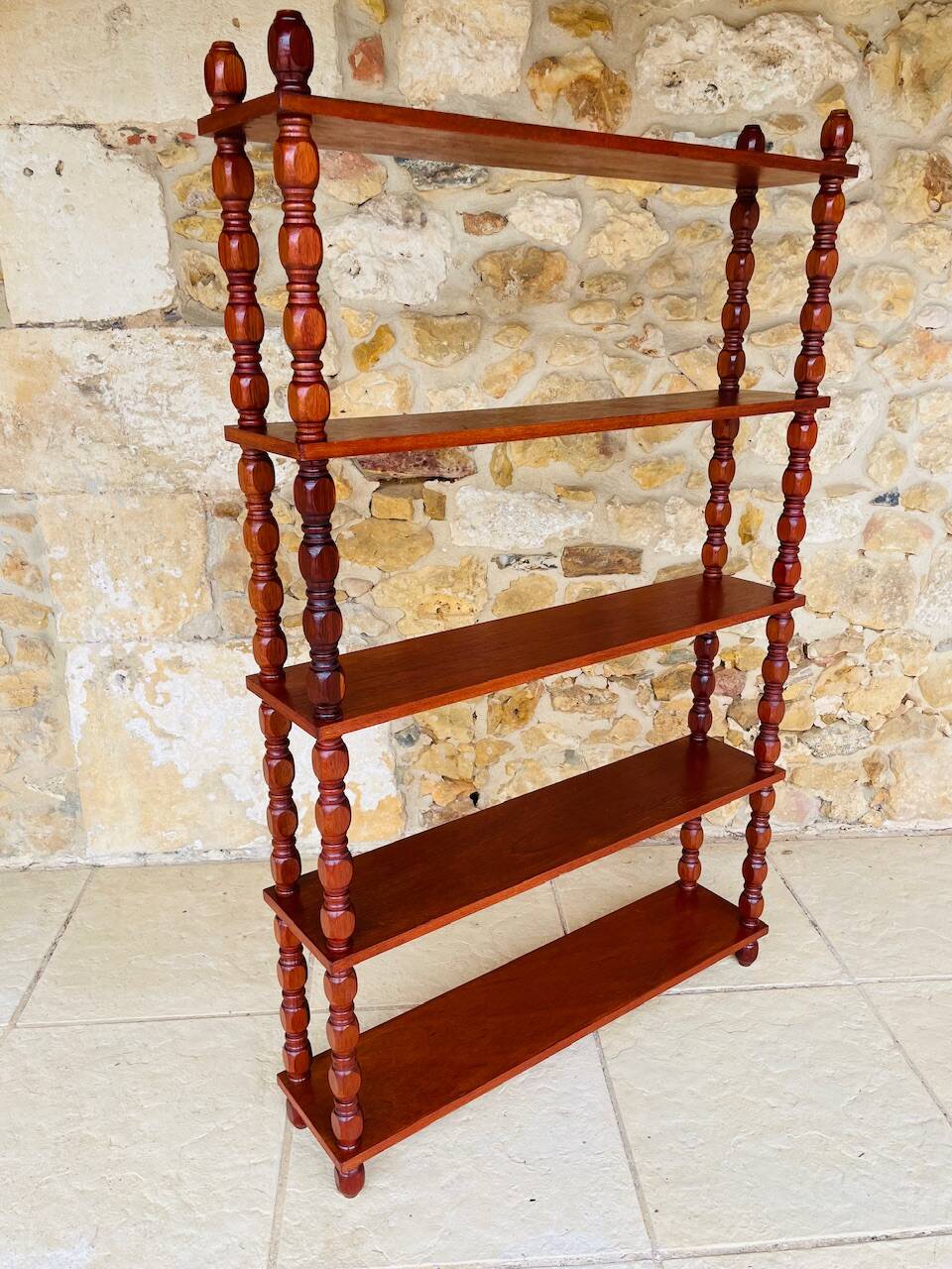 Vintage 5-tier turned wood shelf on legs.