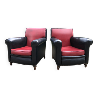 Duo de fauteuils club vintage en skaï rouge et noir