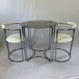 Chrome table and two modernist chairs