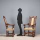 Pair of antique Baroque armchairs in walnut and fabric, Italy, 17th century.