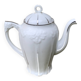 Porcelain coffee pot with floral pattern and silver stem