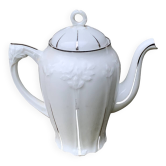 Porcelain coffee pot with floral pattern and silver stem