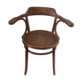 Curved wood armchair