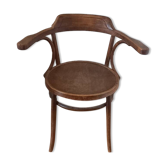 Curved wood armchair
