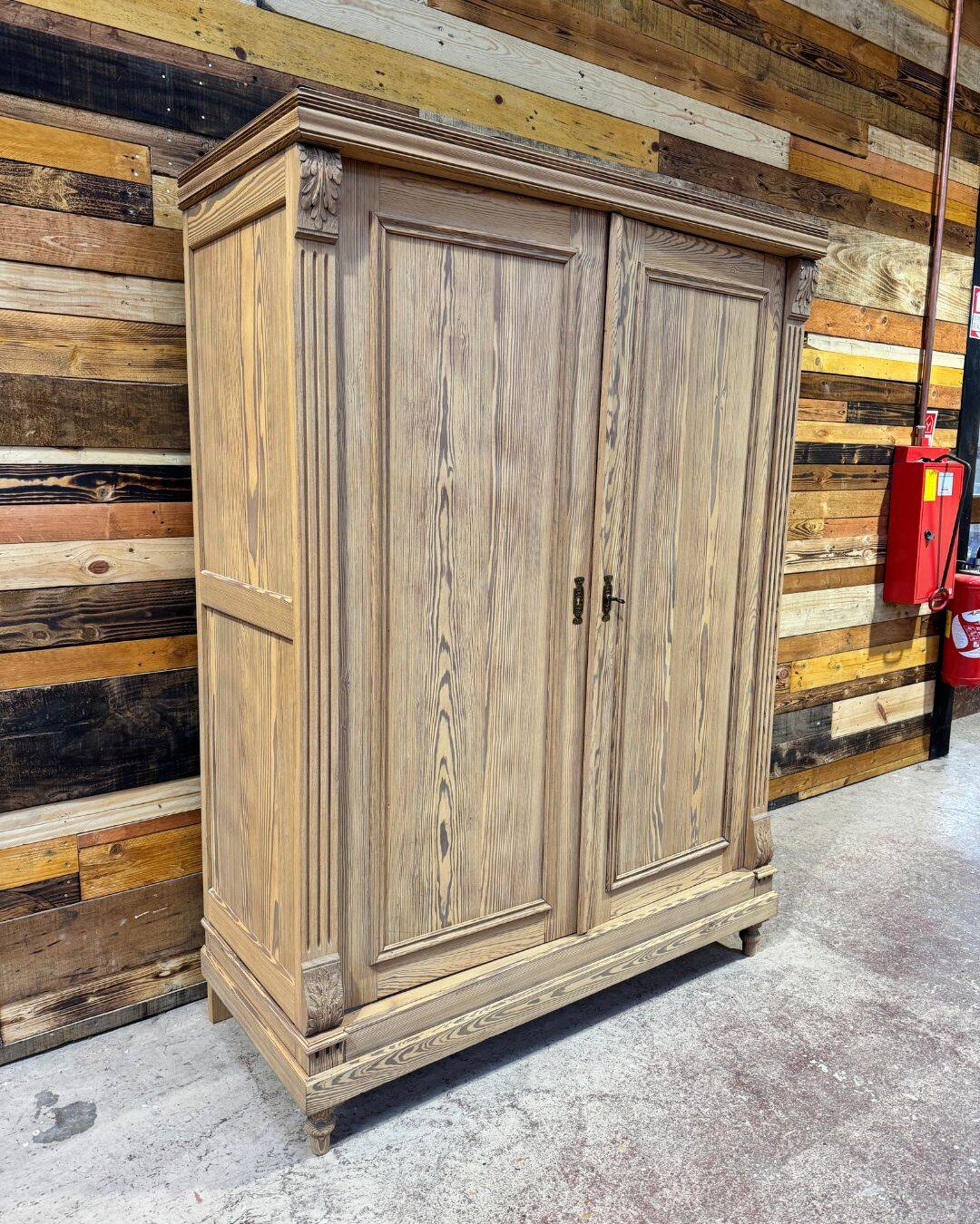 Small antique wardrobe in solid pitch pine.