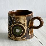 Signed ceramic mug.