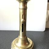 Brass candle holder with push button