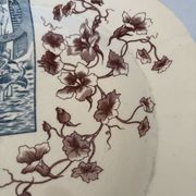 Assiette terre de fer sépia et bleu Longchamp - terre de fer cigognes