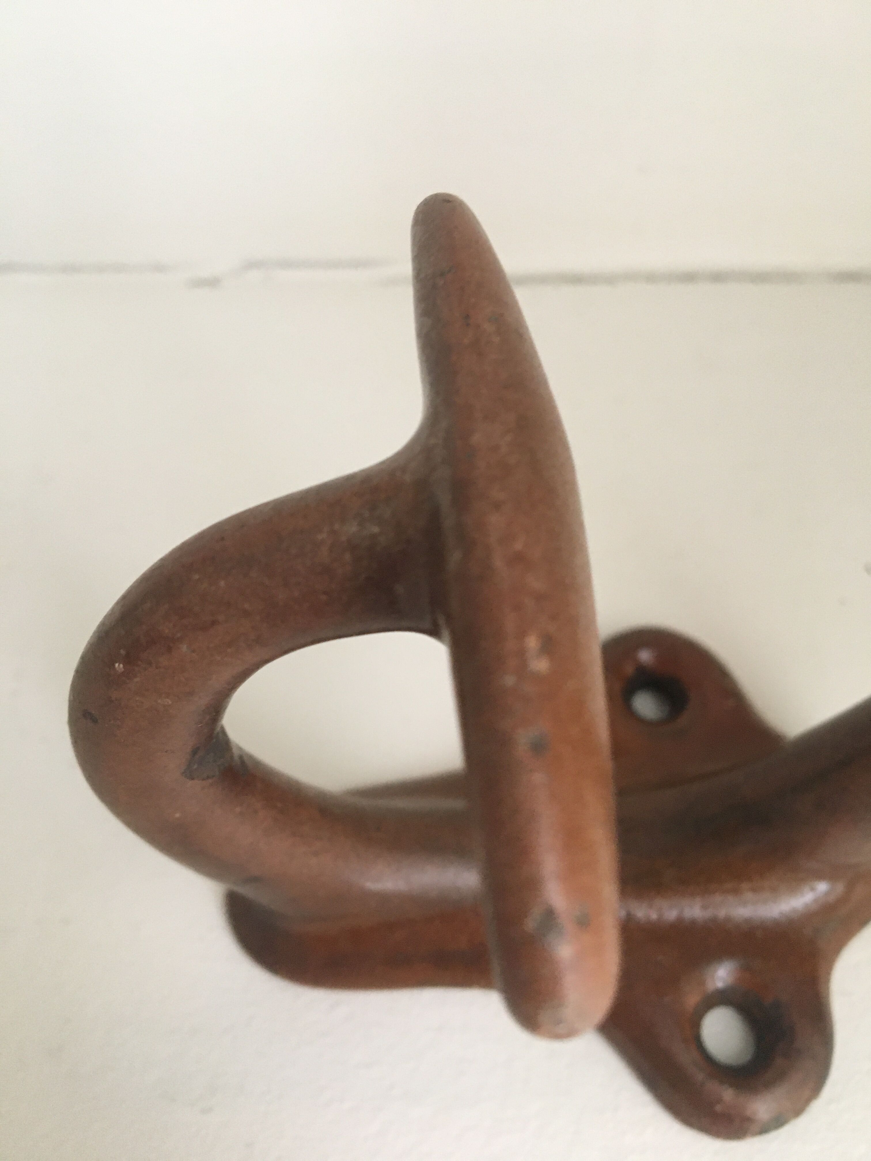 Enamelled cast iron coat rack