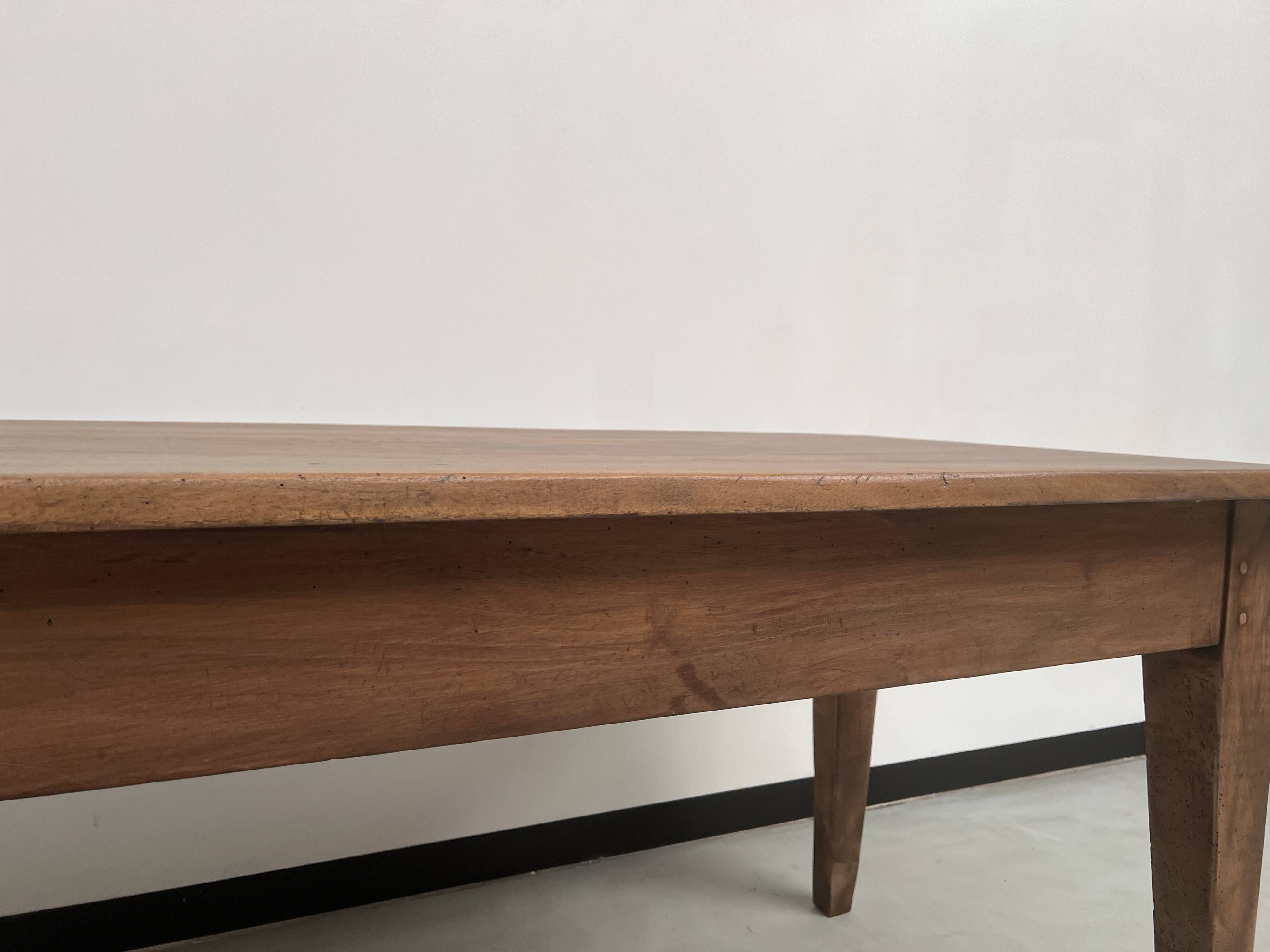 Solid walnut farmhouse table with spindle legs